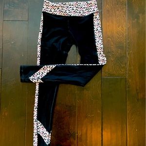 Trina Turk leggings. Black with multi color trim. Gently worn a couple times.